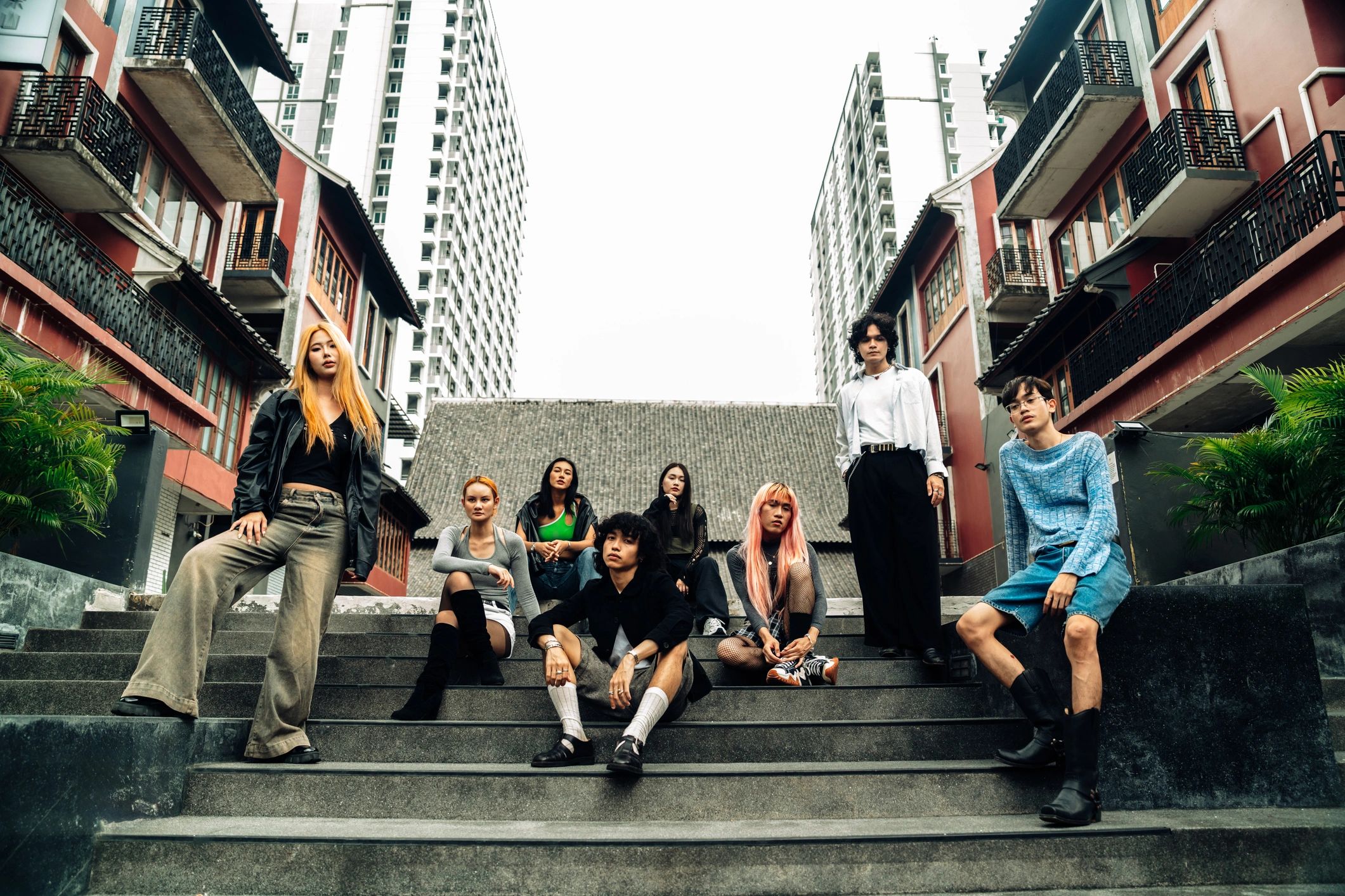 Stylish diverse young adults gathered in an urban setting